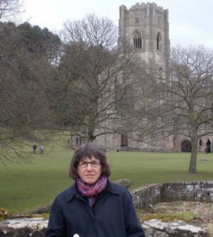 Mary Brydon Miller in front of an English church.