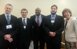 From left to right: Kevin Davis, Bryan Brown and Andrew Puterbaugh with Leland Melvin (center) and Diane DeTroye from NASA Headquarters. Photo courtesy of OSGC