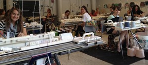 UC students with the new hand-knitting machines.