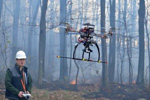 UC student Wei Wei controls a UAV