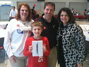 Photo of contest winner Bill Boyle, his family and Provost Davenport.