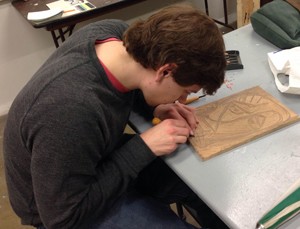 UC student at work in new art therapy course.