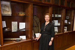 Elizabeth Frierson, faculty director of the World War I institute, at the Winkler Center exhibit.