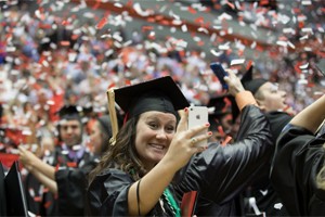 graduate celebrates at commencement