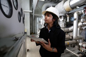 Co-op student working in a power plant.