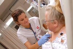 College of Nursing student with a patient.