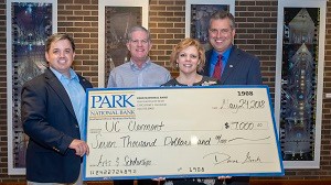 Park National Bank presents a $7,000 sponsorship in support of UC ClermontÂ s Community Arts Program and student scholarships. From left: UC Clermont Director of Development Denny Sketch; UC Clermont Dean Jeff Bauer; UC Clermont Program Director Nikki Varg