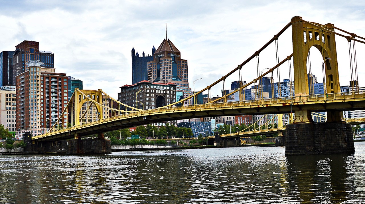 view of yellow bridge in Pittsburgh from riverfront