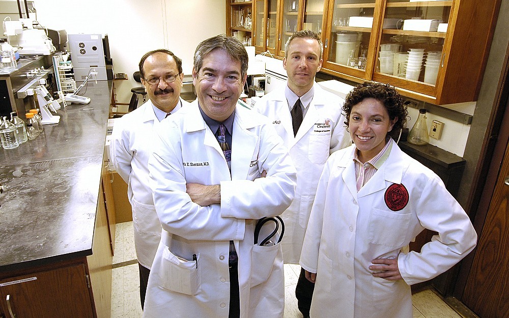 Ken Sherman, MD, (front left) and (from left to right) Tarek Shata, MD, Jason Blackard, PhD, and Norah Shire.