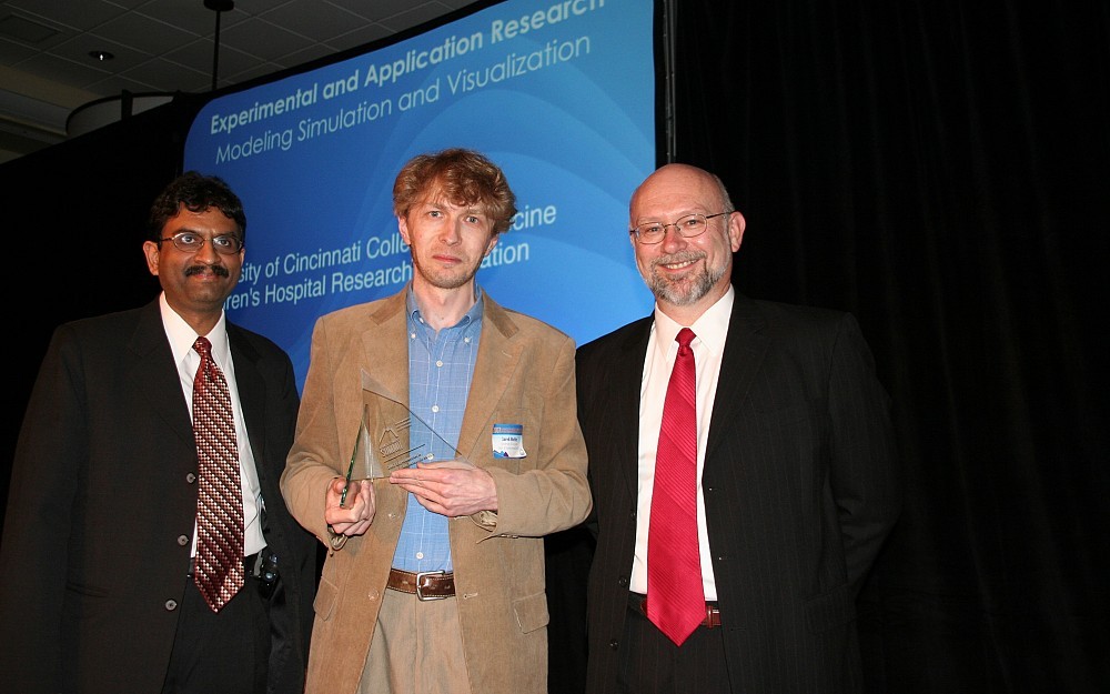 Jack Meller, PhD, (center), received the Advanced Technology Summit award at the 2007 Advanced Technology Summit sponsored by the Ohio Supercomputer Center. 