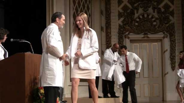 Students from the College of Medicine Class of 2015 receive their white coats by faculty of the college. 