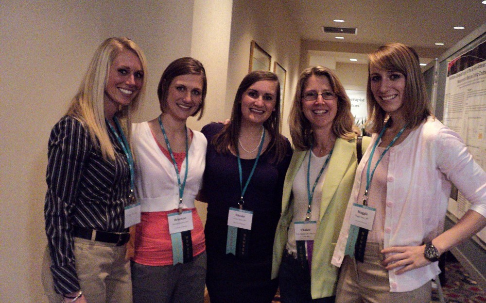 Chalee Engelhard (second from the right) at a conference with her students in Spring 2011.