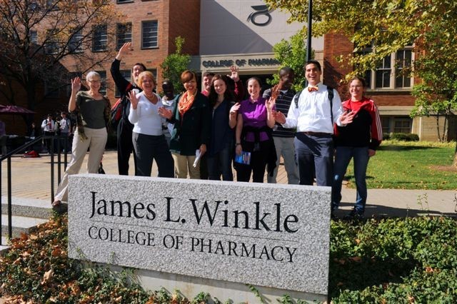 Pharmacy students outside the James L. Winkle College of Pharmacy