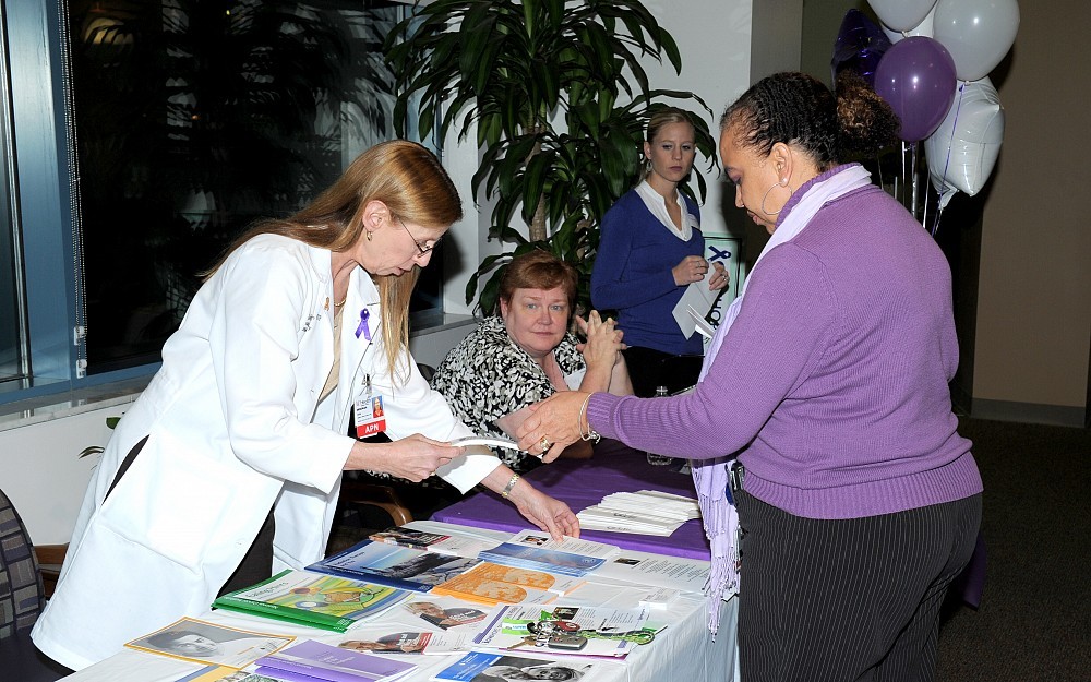 Staff distributed information about pancreatic cancer at a public reception in 2011.