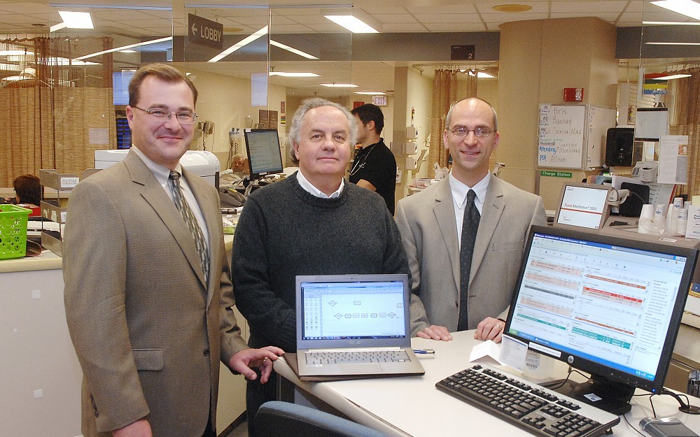Michael Lyons, MD, David Kelton, PhD, and Michael Ward, MD, in UC Health University Hospital Center for Emergency Care