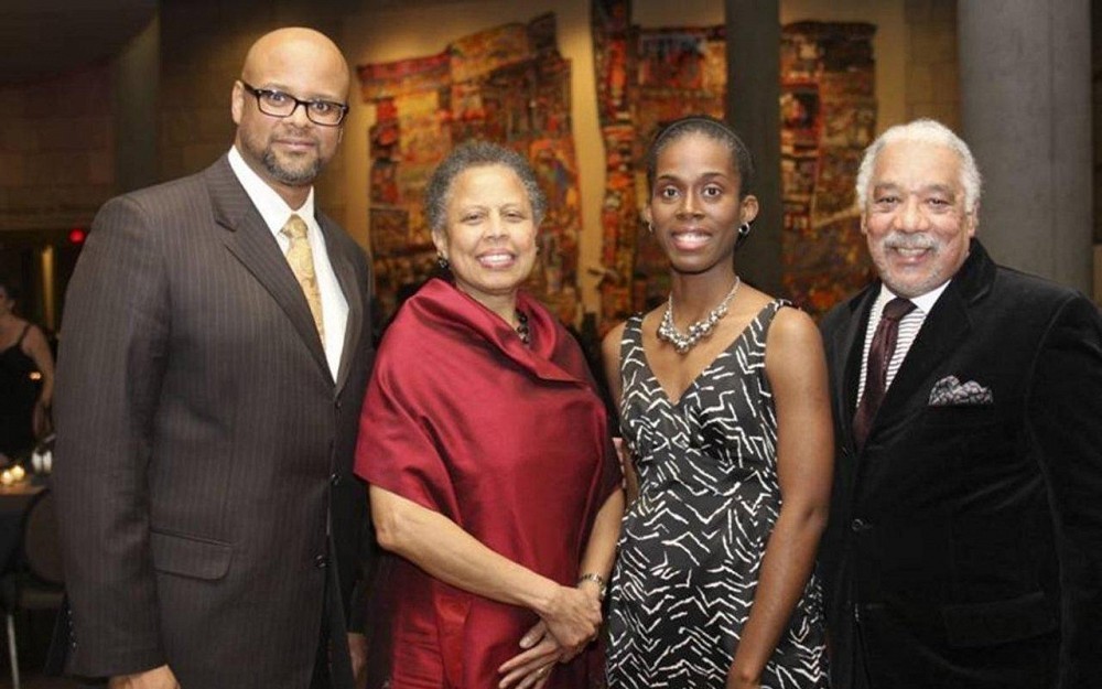 From left to right: William Harris II, program coordinator in UCÂ s Office of Diversity and Community Affairs, Johnie Davis, Imani Driskell, Oxley scholar, and Kenneth Davis, MD, professor in UC's department of surgery
