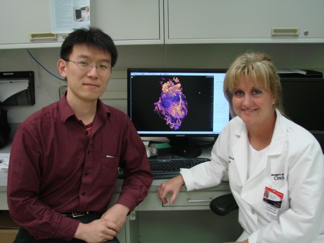 Jason Qi, PhD, and Kati LaSance with images created in the VCIL