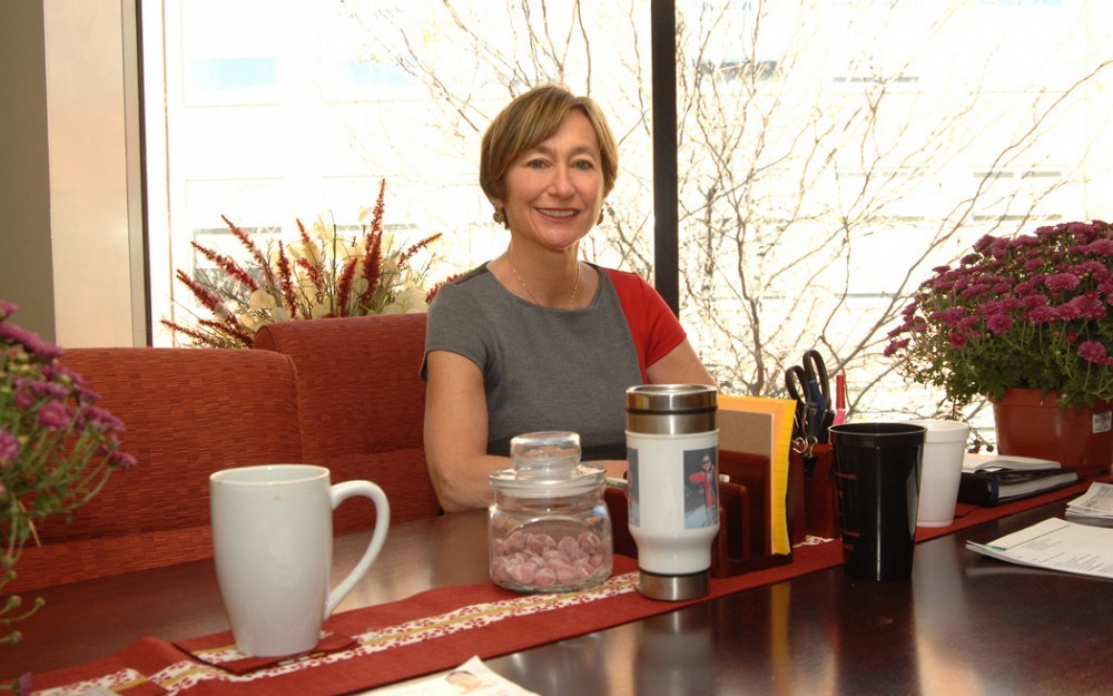 Greer Glazer, PhD, dean of the UC College of Nursing, at her desk in Procter Hall.