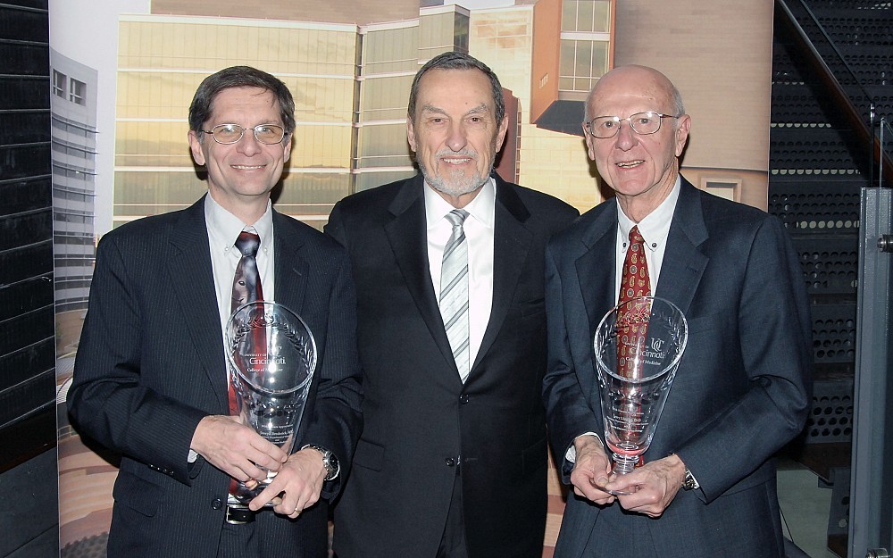 Thomas Boat, MD, dean of the College of Medicine, is flanked by honorees Joseph Broderick, MD (left), and Jerry Lingrel, PhD.