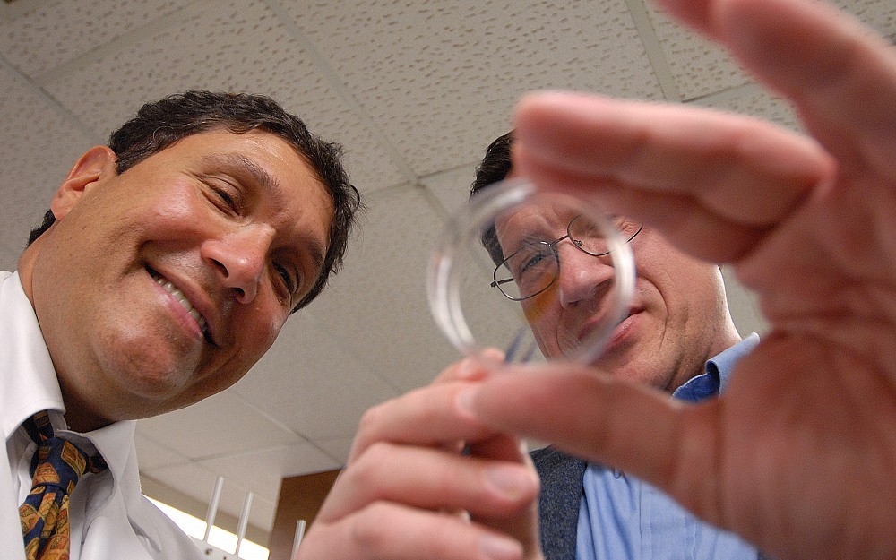 
Jonathan Bernstein, MD (left), and Anastasios Angelopoulos, PhD, are shown working on allergy research at the University of Cincinnati.
