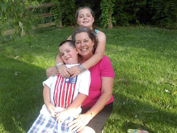 Paula Hoevel with her grandchildren, Julia and Justin.