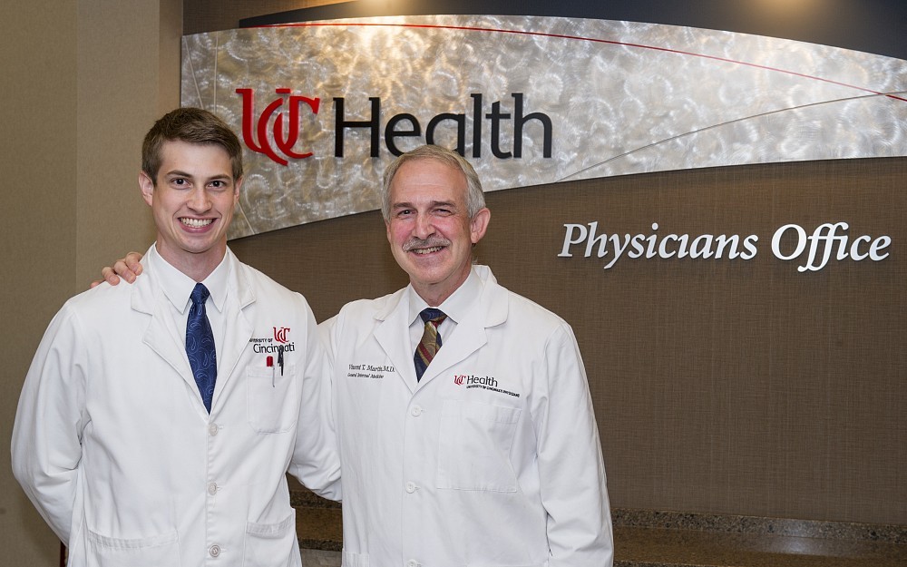 Andrew Martin, a fourth-year medical student, shown with his father, Vincent Martin, MD, co-director of the Headache and Facial Pain Center at the UC Gardner Neuroscience Institute and professor of medicine in the Department of Internal Medicine.



