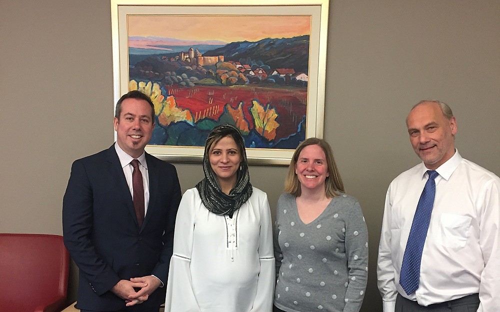 From left to right: Dean Neil MacKinnon, graduate stuent Lamyaa AL-Sarkhi, Joan Garrett, PhD, and Georg Weber, MD, PhD